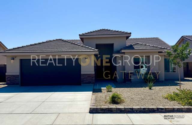 Enjoy those Arizona Sunset in this Three Bedroom Two Bath Home full of upgrades !! photos photos