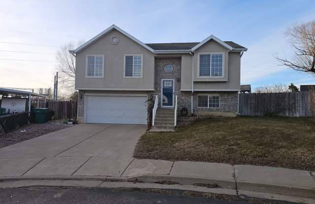 Spacious 4-Bed, 2-Bath Pet-Friendly Home with Central Air  2-Car Garage! - Available NOW! photos photos