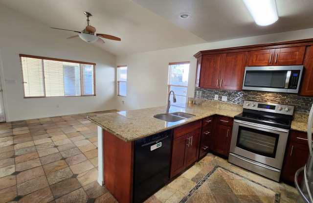 Single Story with large covered patio. Two car garage with uncovered gated parking stall. New vinyl flooring. photos photos Single Story with large covered patio. Two car garage with uncovered gated parking stall. New vinyl flooring. photos photos
