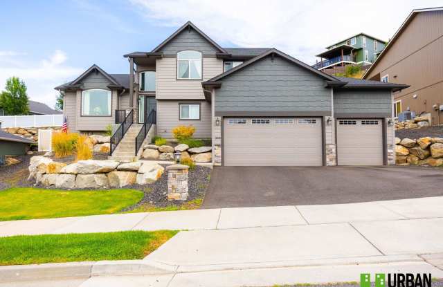 Modern Split-Level Home with Gourmet Kitchen  3-Car Garage in Northwood Terrace photos photos