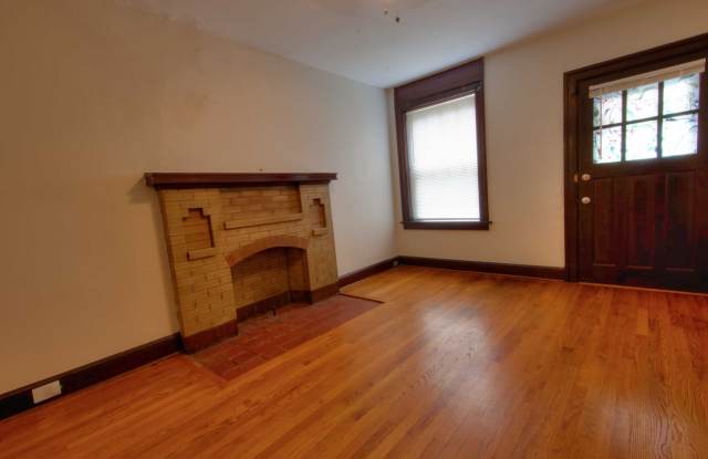 This completely refinished two-bedroom, one-bathroom home features brilliant hardwood floors throughout. Gallery 4