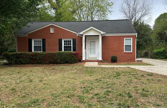 This spacious 2 bedroom home has an airy feel. Located in a neighborhood minutes from downtown and with tree lined streets. This is a must see home! photos photos
