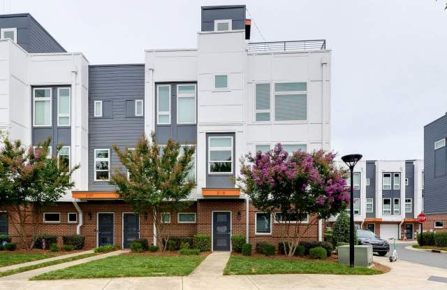 Stunning South End end unit townhome in the modern and amazing Southpoint community. photos photos