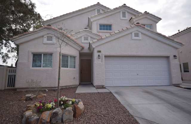 Incredible home with the Master bedroom on the first floor and junior suite upstairs in a gated community. Gallery 1