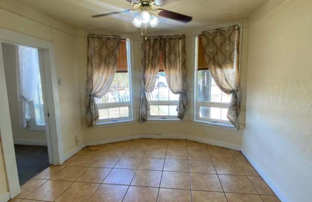 2 bedroom, 1 bathroom house, fenced yard, above downtown Gallery 3