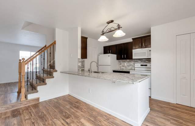 2 Bedroom Duplex with Updates, Large Fenced Backyard, Patio and Spacious RV Parking Gallery 1