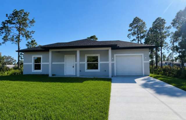 ONE OF A KIND! BRAND NEW 1 Bedroom-1 Bath- 1 Car Garage in Desirable Lehigh Acres! photos photos