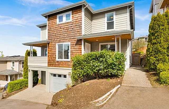 Spacious 3-Story Home with 2 Car Garage and Large Deck! photos photos