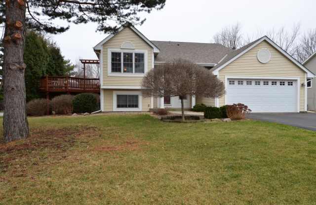 Beautiful 4-Bed 2-Bath Home in Eagan! Large Lot with Private Deck! photos photos