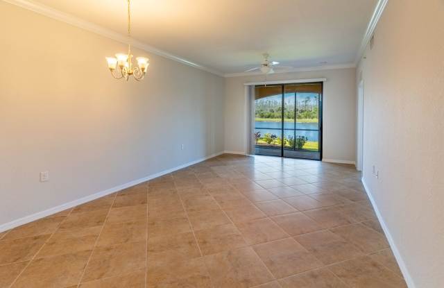 Stunning 2BR/2BA Acqua Ct. First-Floor Unit with Lake Views in Treviso Bay – Resort-Style Living Awaits! photos photos