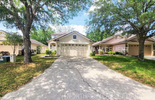 Spacious 4BR w/ Fenced Yard + Covered Lanai + 2 Car Garage in Orange Park! photos photos