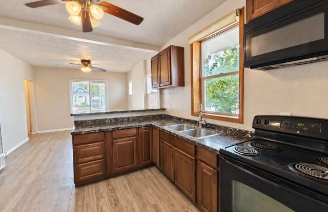 Charming 2-Bedroom SLC Home with In-Unit Laundry & Large Backyard Gallery 1