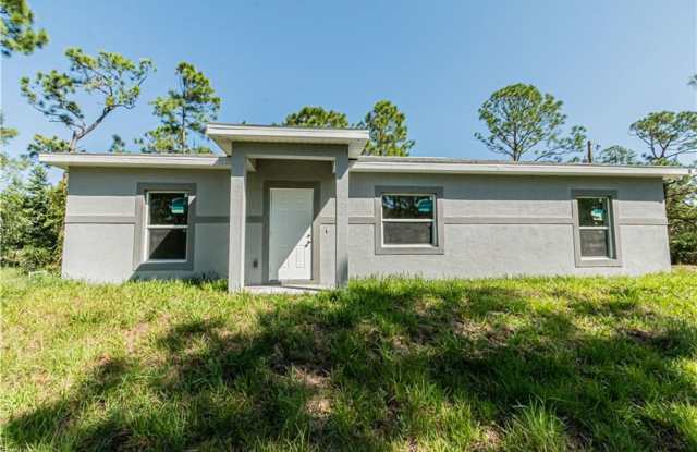 AVAILABLE NOW-TROPIC ACRES-THREE BEDROOM TWO BATH SINGLE FAMILY HOME. - 12325 Graffiti Drive, Charlotte County, FL 33955