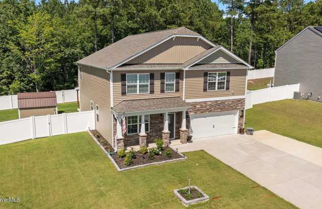 Spacious 4-Bedroom Home with Solar Panels  Private Yard – Pets Welcome! photos photos