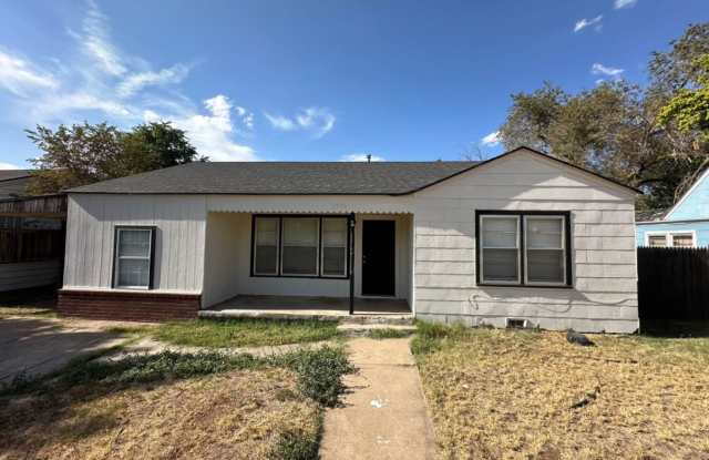 Cute 4 bedroom, 2 bath home with a carport and a big back yard! photos photos