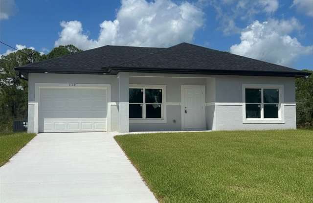 Brand-New Modern 2BR/2BA Home with Garage – Quiet Lake Placid Neighborhood photos photos