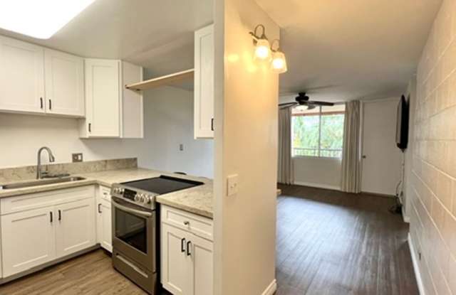 AVAILABLE NOW! Spacious 3-Bedroom, 2-Bath Corner-end Split-level Unit in Kaneohe with 1 Assigned Parking Stall photos photos