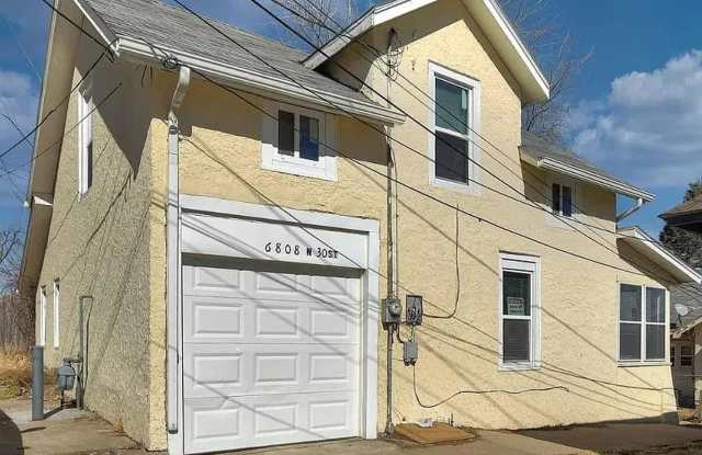 6808 N 30th St - 2 Bed/1 Bath in North Omaha | Built-In Garage, Period Details, Fresh Updates photos photos