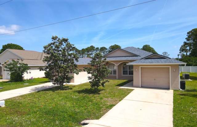 Roomy 3 Bed 2 Bath Duplex Home w Screened Lani for Rent in Palm Coast! photos photos