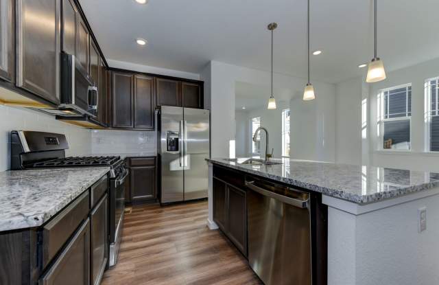 Beautiful 4 bed, 3 bath Townhome with 2 car garage ready for move in! photos photos