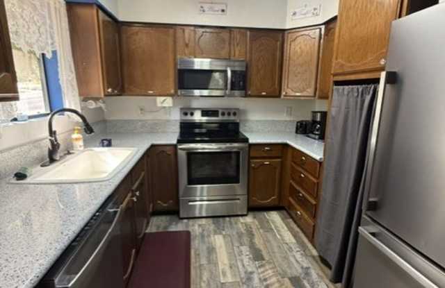 Completely Furnished long Term Rental- 2 Bedroom Home with Loft - Contact Property Pros Property Management Gallery 4