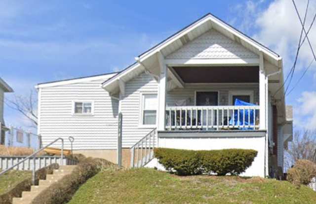 SPACIOUS 2-BEDROOM HOME WITH FINISHED BASEMENT + OFF-STREET PARKING | 15226 Gallery 1