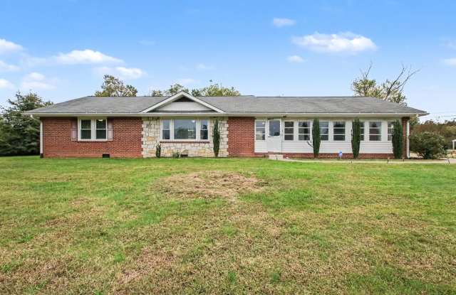 Charming Rambler with 2 Primary Suites with Fenced in Yard Gallery 1