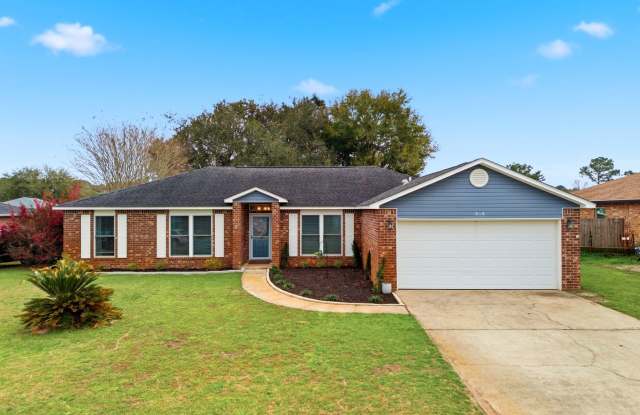 Welcome to This Beautifully Maintained 4/2 Brick Home by the Base! photos photos