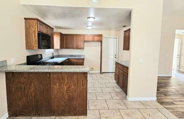 Spacious Single-Story Home with Central AC/Heat and Huge Backyard Gallery 4