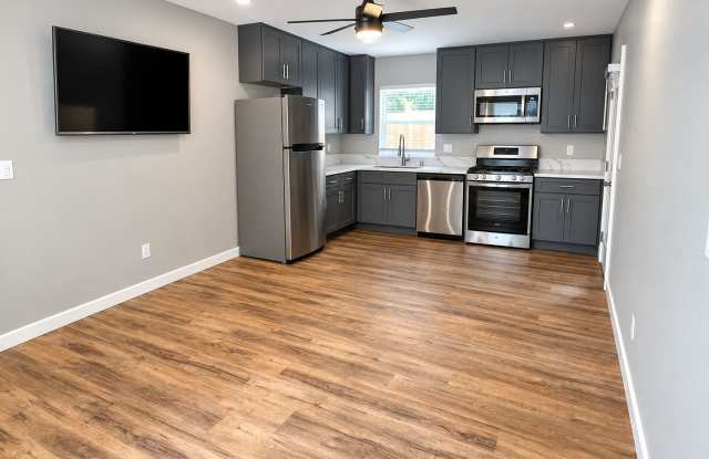 Rare 4-Bedroom, 4-Bathroom Home Near Campus with a Great Courtyard! Gallery 1