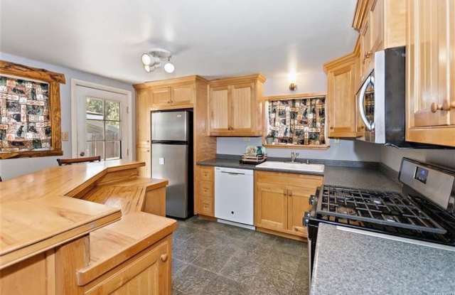 Cozy Cabin in the Woods photos photos