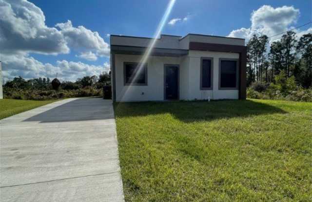681 Windermere Drive - 681 Windermere Drive, Lehigh Acres, FL 33972