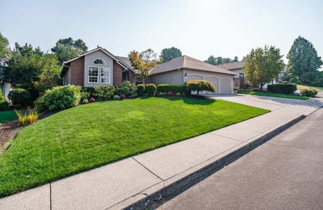 Beautifully Landscaped 1/4 acre with Well Maintained 4 bedroom 2 Bath Home with 3 Car Garage photos photos