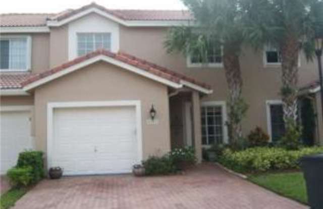 6241 NW 74th Court - 6241 NW 74th Ct, Parkland, FL 33067