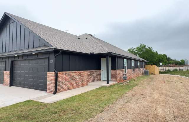 Welcome to Brand New Masonwood featuring this 3 Bedroom 2 Bath 2 Car Garage Duplex in a Great location close to the Broadway Extension and only 8 minutes from downtown OKC photos photos