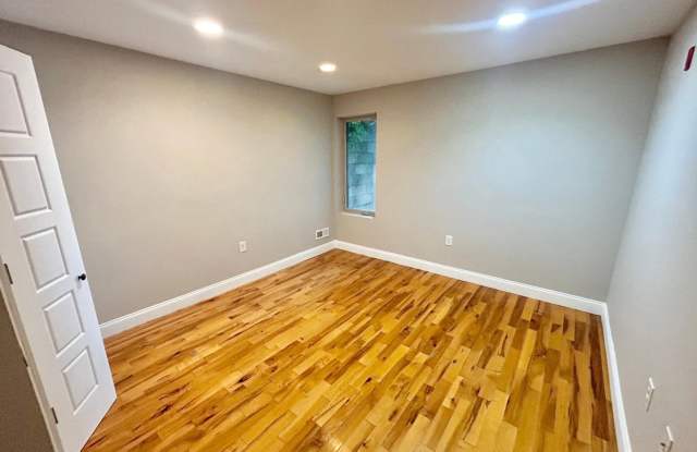 Spacious 3-Bedroom, 2-Bath Apartment with Finished Basement, Private Patio, and In-Unit Laundry Gallery 4
