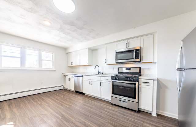 Available APRIL 2026 - Beautiful Renovated w/ Lots of Natural Light and Backyard Space! - 2313 Elsie Street, Pittsburgh, PA 15210