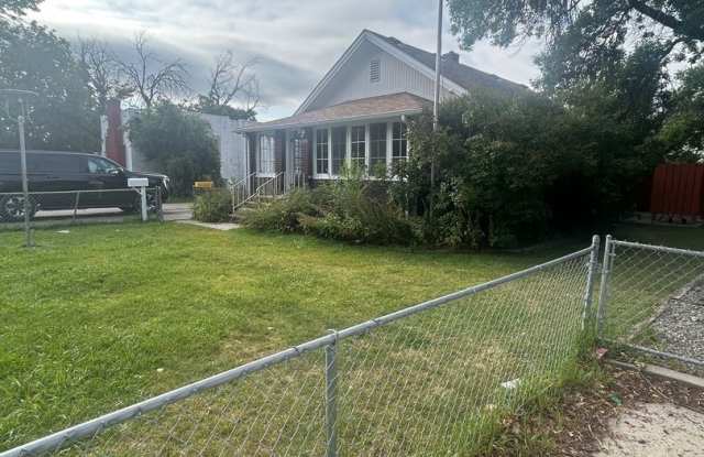 Charming 2-Bed, 2-Bath Home with Garage, Fenced Yard  Tons of Potential! photos photos