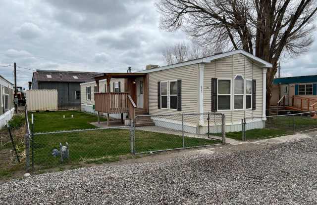 3 Bedroom 2 Bath High-End Mobile Home with Fenced Yard, Covered Porch, Storage Unit. photos photos