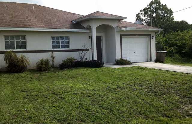 1943 E 12th ST - 1943 E 12th St, Lehigh Acres, FL 33972