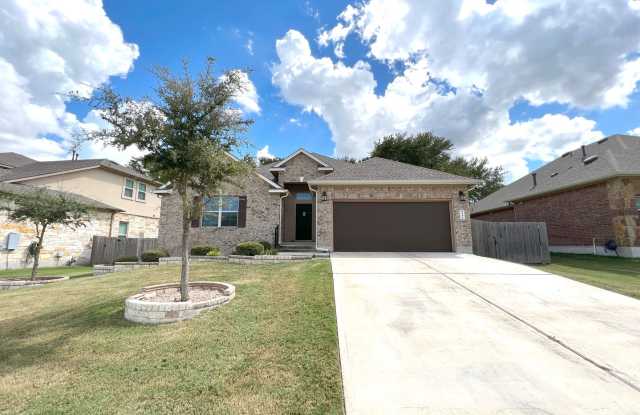 The upgraded single-story home with 4 bedrooms and 2 bathrooms for rent in Whispering Hollow, Buda, TX photos photos