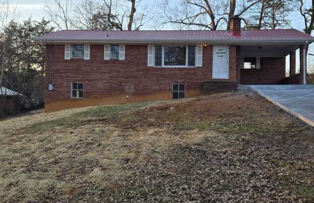 Charming 3-Bedroom, 2-Bathroom Brick Home for Rent photos photos