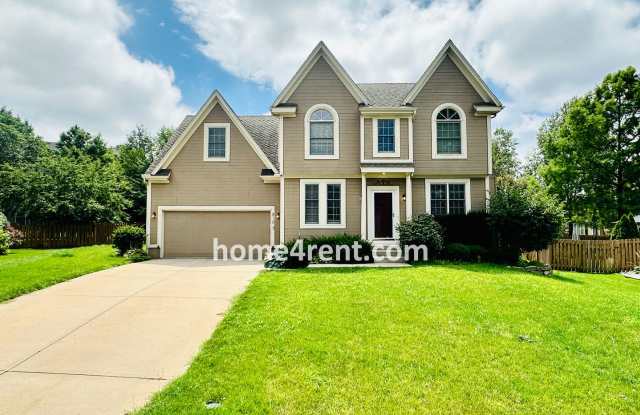 Fantastic South Overland Park Home in Blue Valley Schools w/ Wood Floors, Updated Kitchen, Finished Basement and Fenced Yard! photos photos