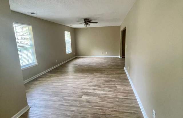 Spacious 4-Bedroom, 2-Bath Home with Fenced Backyard & Lawn Care Included Gallery 3