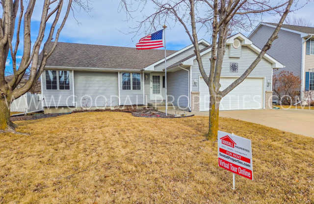 Spacious 5-Bedroom Ranch in the Heart of Waukee with a fenced in yard - 315 Terrace Drive, Waukee, IA 50263