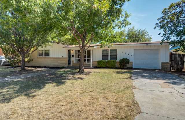 Charming 3-Bedroom Home Near Texas Tech – Bonus Shop Included! Gallery 1