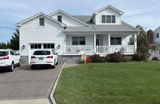 69 S Bay Avenue - 69 South Bay Avenue, Massapequa, NY 11758