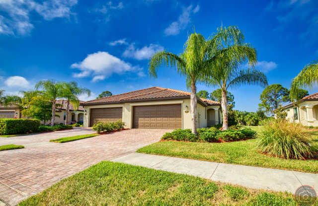 Annual Unfurnished Rental: 2 Bedrooms plus Den, 2 Bath Villa with Resort Like Amenities – Gran Paradiso Community! photos photos
