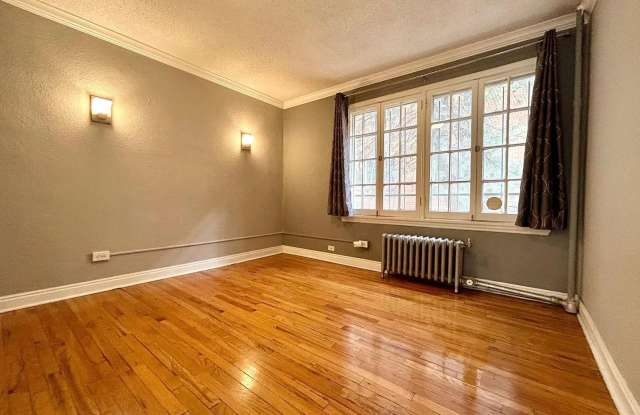 $500.00 off First Months Rent! Gorgeous 2-Bedroom, 2-Bath Condo Near Cheesman Park – Featuring Hardwood Floors, In-Unit Laundry, and Extra Storage. Available Now!! photos photos