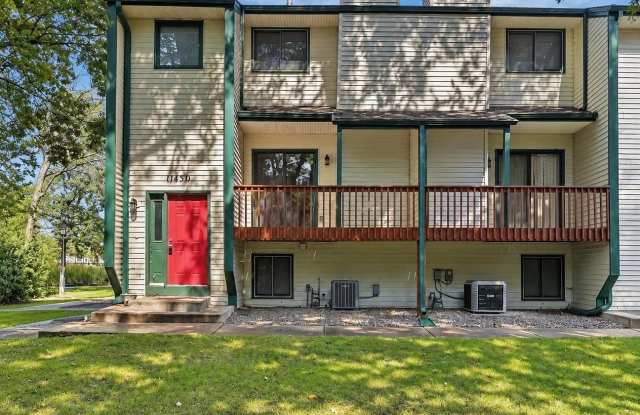Spacious 3-Bed End-Unit Townhome with 2-Car Garage & Private Deck Gallery 1